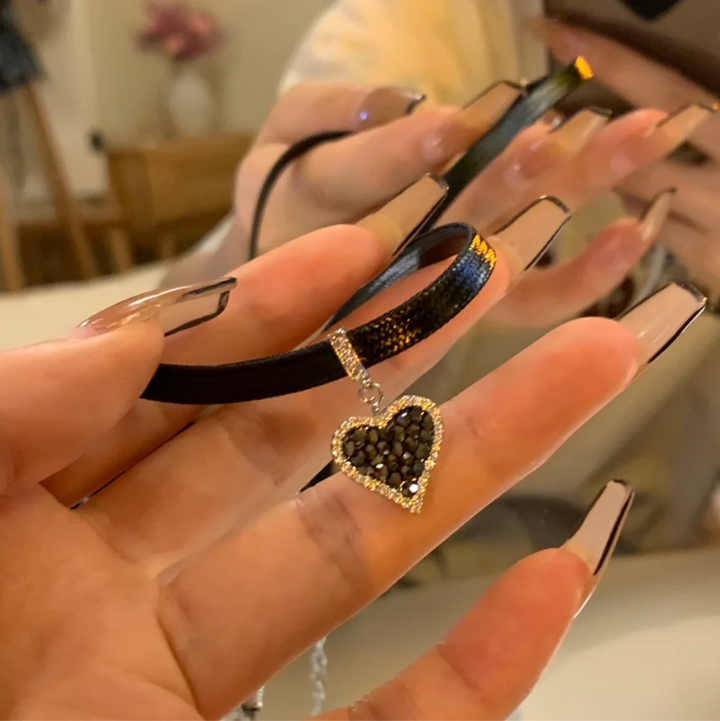 Sparkling Black Heart Earrings with Diamond Accents