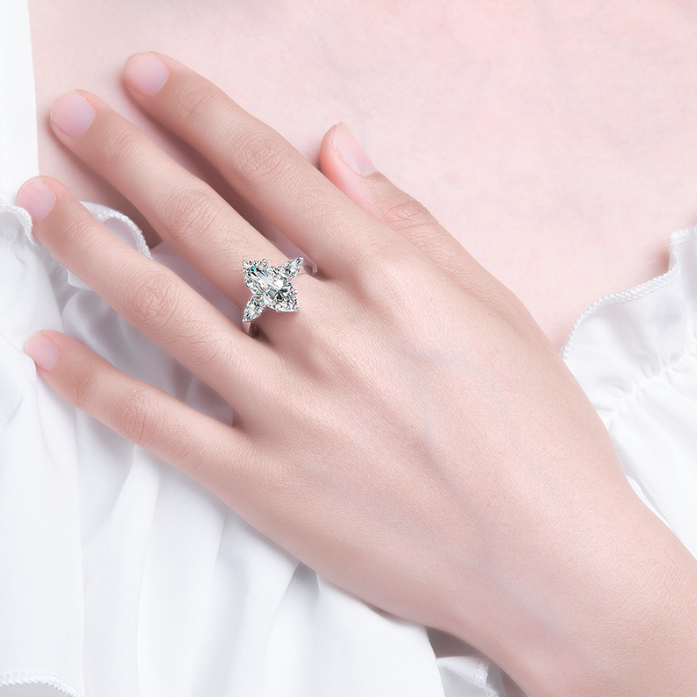 Marquise Cut Three Stone Engagement Ring In Sterling Silver