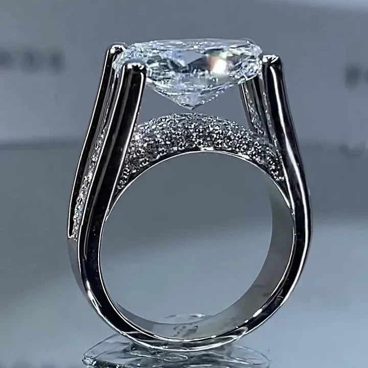 Distinctive Inverted Tension-set Oval Cut Sterling Silver Engagement Ring