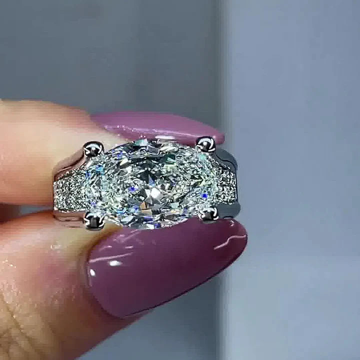 Distinctive Inverted Tension-set Oval Cut Sterling Silver Engagement Ring