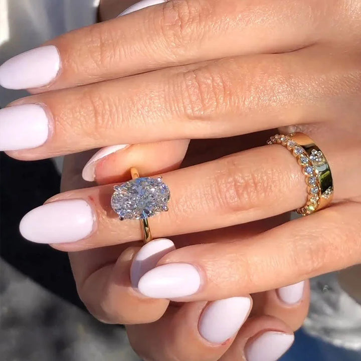 Stunning Oval Cut Sterling Silver Bridal Set in Golden Tone, Receive 2 Free Additional Rings