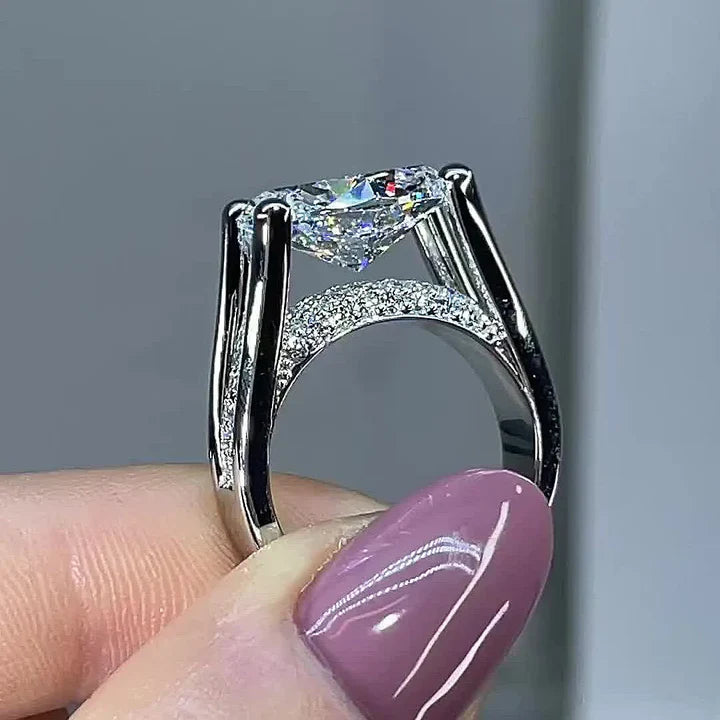 Distinctive Inverted Tension-set Oval Cut Sterling Silver Engagement Ring