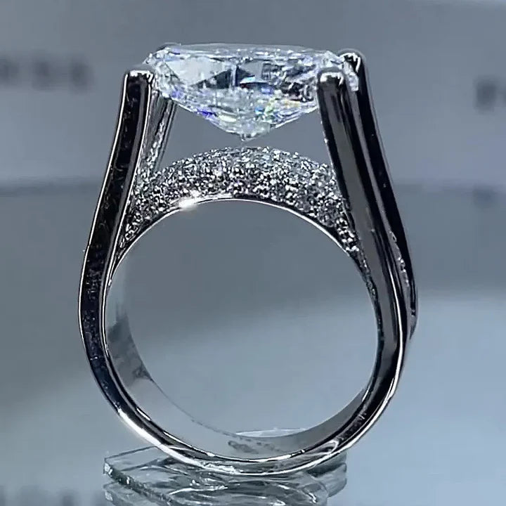 Distinctive Inverted Tension-set Oval Cut Sterling Silver Engagement Ring