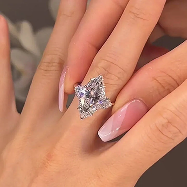 Marquise Cut Three Stone Engagement Ring In Sterling Silver